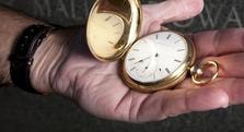 Major Jonathan Ladd's gold pocket watch — front and back views